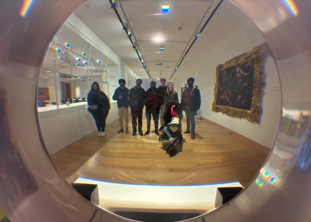 Picture of Professor Corson, Kinithi, Mukhtiar, Carter, Karthik, Seth, Mohammad, and Apoorva at the Spencer Museum.