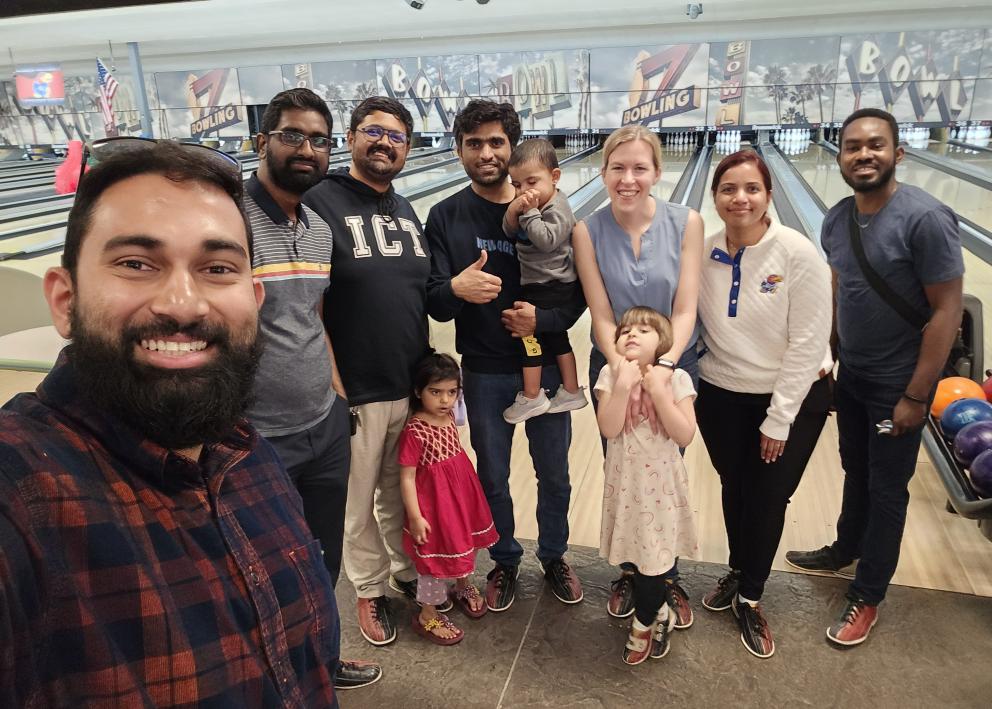 Lakshan, Karthik, Apoorva, Mukhtiar, Professor Corson, Kinithi, and Seth at the bowling alley.