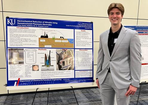 Carter Stokes (KU, ChemE) presents his poster on the electrochemical reduction of nitrate.