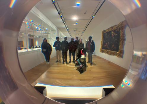 Picture of Professor Corson, Kinithi, Mukhtiar, Carter, Karthik, Seth, Mohammad, and Apoorva at the Spencer Museum.