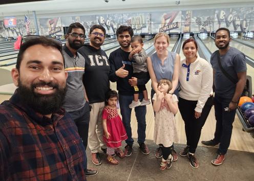Lakshan, Karthik, Apoorva, Mukhtiar, Professor Corson, Kinithi, and Seth at the bowling alley.
